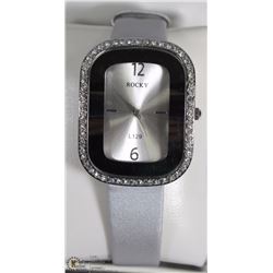23) ROCKY SILVER TONE FASHION WATCH W/ STONES