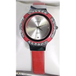 19) RED STRAP FASHION WATCH W/ STONES