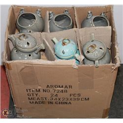 CASE OF AROMA OIL POTS.