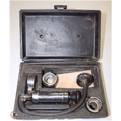 COOLING SYSTEM PRESSURE TESTER.