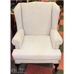 GREY FABRIC ACCENT WING CHAIR.
