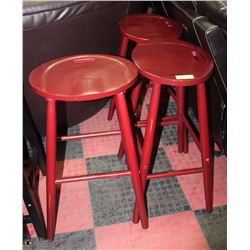 3 RED WOOD BAR STOOLS.
