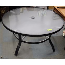 ROUND LOW PATIO TABLE.