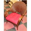 Image 1 : WICKER LOUNGE CHAIR WITH CUSHION.