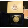 Image 1 : 1871-1971 British Columbia encased Dollar in original box of issue. Brilliant Uncirculated.