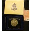 Image 1 : 1871-1971 British Columbia encased Dollar in original box of issue. Brilliant Uncirculated.