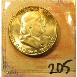 1954 S Franklin Half Dollar. BU in flip, toned.