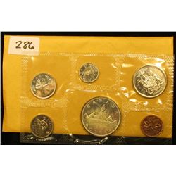 1965 Canada six-piece Mint Set with .800 Fine Silver Voyageur Dollar in original envelope as issue.