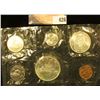 Image 1 : 1966 Canada six-piece Mint Set with .800 Fine Silver Voyageur Dollar in original cellophane as issue