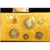 Image 1 : 1965 Canada six-piece Mint Set with .800 Fine Silver Voyageur Dollar in original cellophane and enve