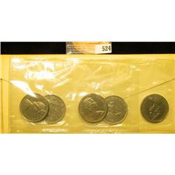 Group of (5) Gem BU 1968 "Voyageur" Dollar Coins in original Royal Canadian Mint cellophane and hold
