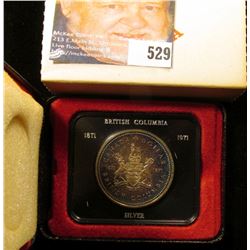 1871-1971 British Columbia encased .500 Fine Silver Dollar in original box of issue. Prooflike.