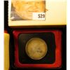 Image 2 : 1871-1971 British Columbia encased .500 Fine Silver Dollar in original box of issue. Prooflike.