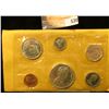 Image 2 : 1867-1967 Canada "Confederation" Uncirculated Coin Mint Set in original cellophane and envelope as i