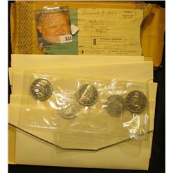 Original packing box from the Royal Canadian Mint which was sent to the family of John Morrell conta