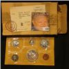 Image 1 : 1965 Canada six-piece Mint Set with .800 Fine Silver Voyageur Dollar in original cellophane and enve