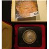 Image 2 : 1871-1971 British Columbia encased .500 Fine Silver Dollar in original box of issue. Prooflike.