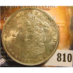 1921 P U.S. Morgan Silver Dollar, Brilliant Uncirculated. Lightly toned.