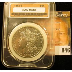 1882 S U.S. Morgan Silver Dollar. Slabbed NAC MS66. (Probably a little over graded).