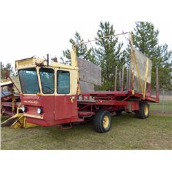 NEW HOLLAND 1049 SELF PROPELLED BALE WAGON