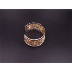 Silver Bracelet with Gold Twisty Design