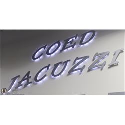 BALANCE OF METAL LETTERING IN GYM.