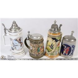 LOT OF 4 DECORATIVE STEINS.