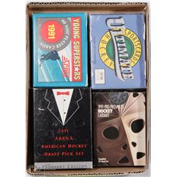 4 BOXES OF HOCKEY CARD SETS INCL. 1991 SCORE YOUNG