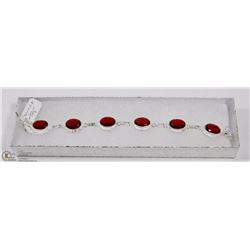 # 32-MAZAMBIQUE GARNET GEMSTONES BRACELET