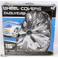 NEW SET OF FOUR 15" WHEEL COVERS.