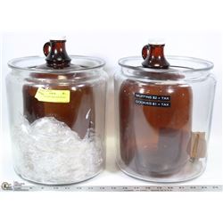 2 LARGE GLASS JARS AND BROWN JUGS