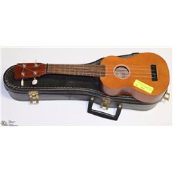 UKULELE MODEL E755M HOWASTARD WITH HARD CASE.