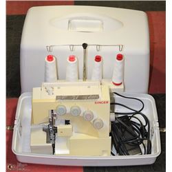 PORTABLE SINGER SURGER SEWING MACHINE IN CASE.