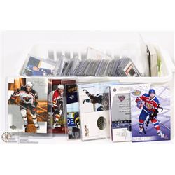 BIN OF ASSORTED HOCKEY CARDS.