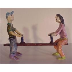 Outsider Art (20th Century), SEESAW, painted and glazed ceramic sculpture, 9" tall, 12 1/2" lon...