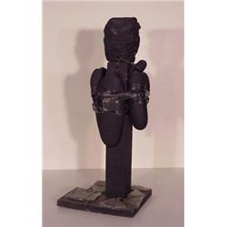 Brian D. Tripp (b. 1945) American, BLACK TOTEM, sculpture of wood, rocks, and glass, string and...