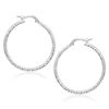 Image 1 : 14K White Gold Tube Textured Round Hoop Earrings