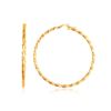 Image 1 : 14K Yellow Gold Patterned Hoop Earrings with Twist Design