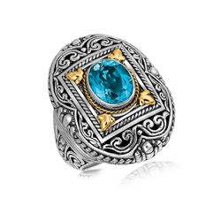 18K Yellow Gold and Sterling Silver Ring with a Framed Blue Topaz Accent
