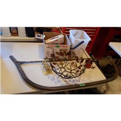 Golf Balls, Oil Container, Buck Saw