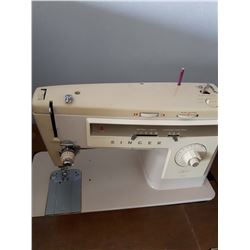 Old Electric Singer Sewing Machine In Cabinet
