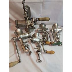 Various Sizes of Old Meat Grinders