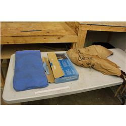 Lot Of Misc. Heated Cushion, Heated Blanket, XL Coveralls, Bits