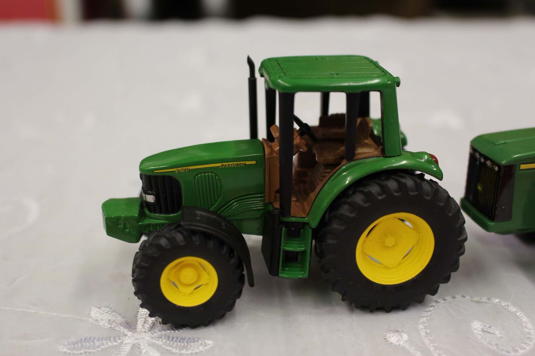 John Deere Toy Tractors (2)& A Tractor Attachment