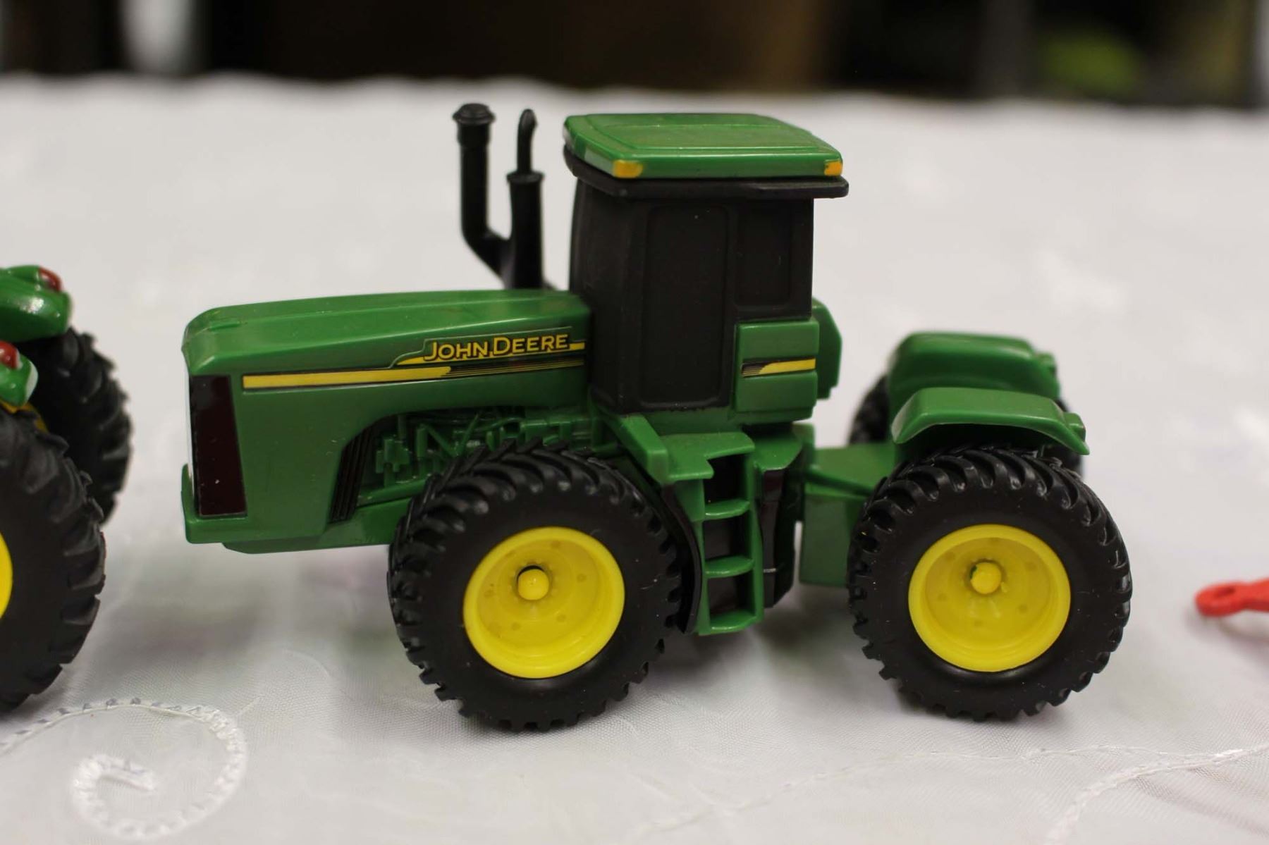 John Deere Toy Tractors (2)& A Tractor Attachment