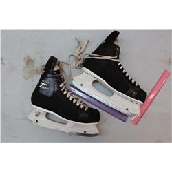 A Pair of CCM Hockey Skates (Size 11)