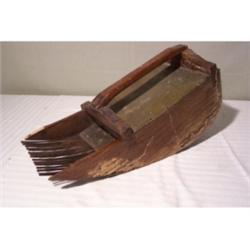 Primitive cranberry shucker