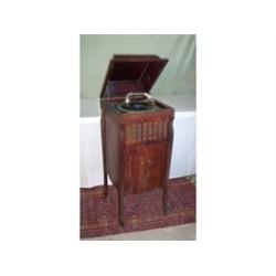 Floor model phonograph and records