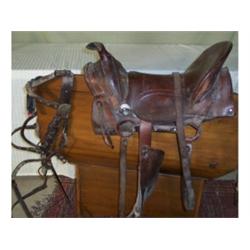 Old western saddle and bridle