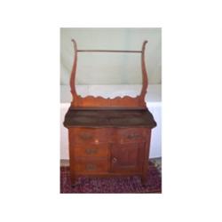 Serpentine-front washstand w/ towel bar